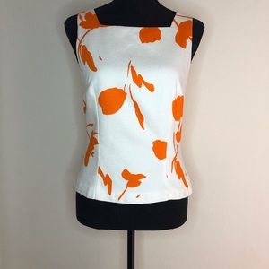 Cotton pique sleeveless button back, fully lined.